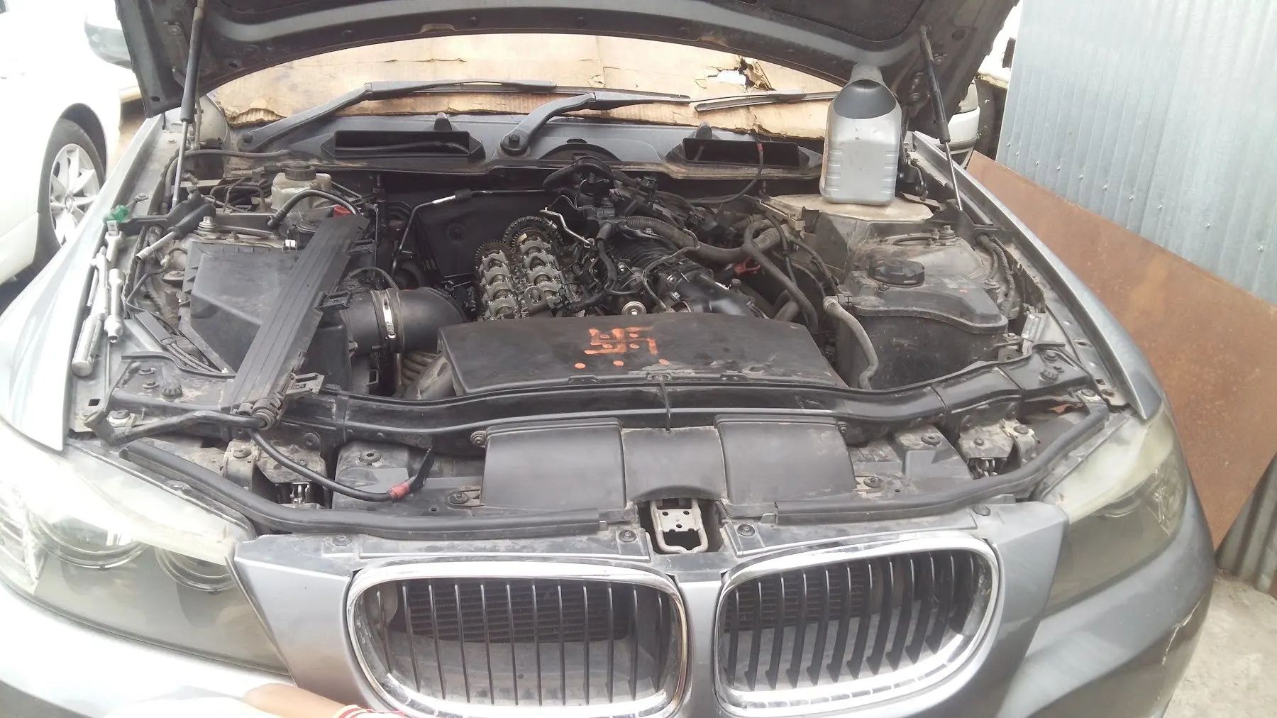BMW 3 Series with the bonnet open at India Automobiles