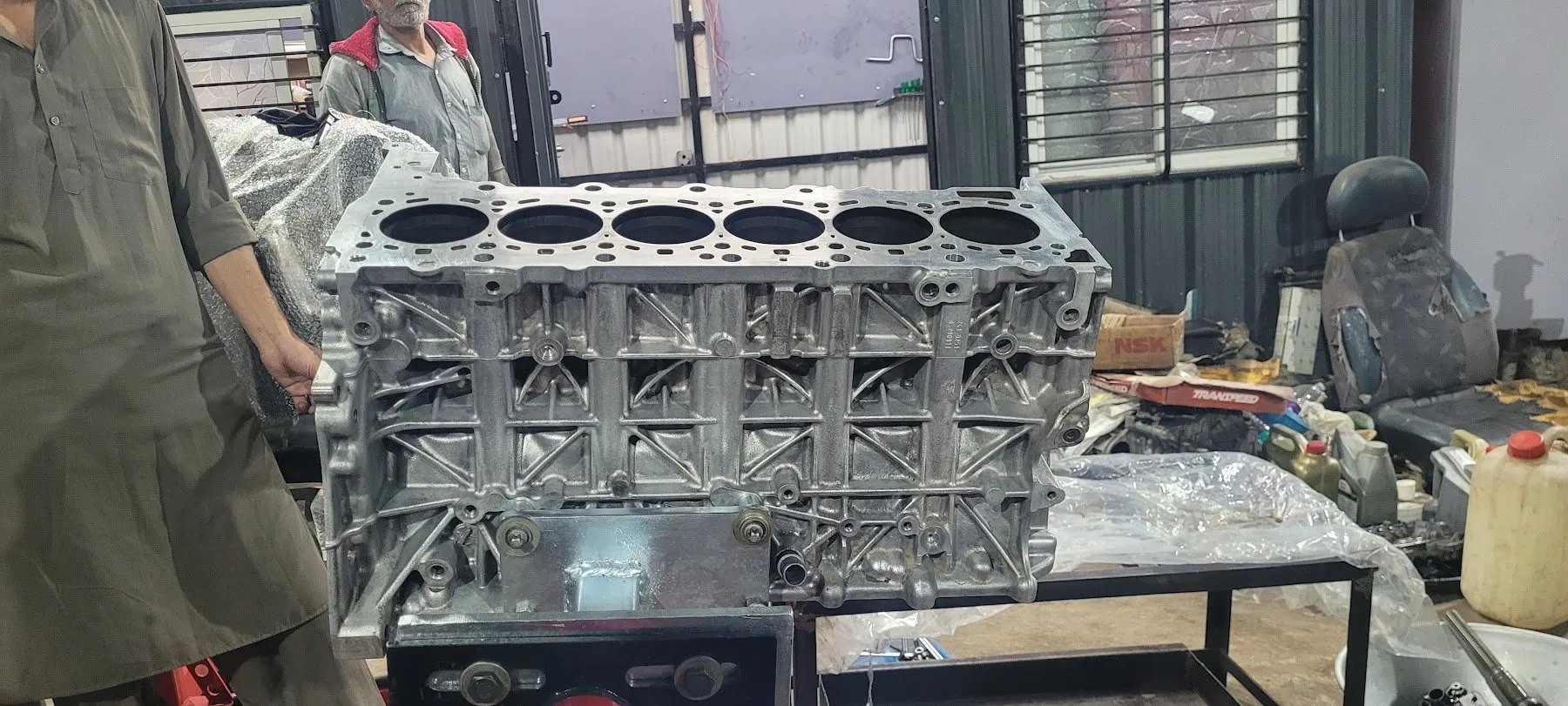 Engine block on the bench during a rebuild