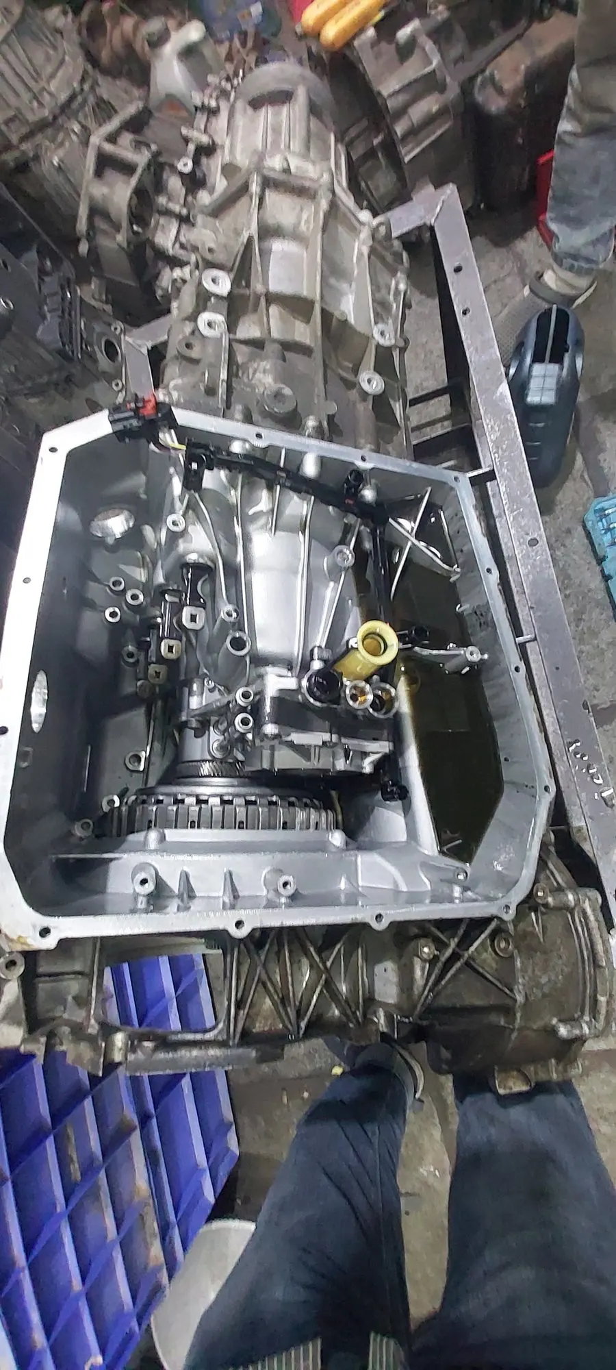 Automatic gearbox upside down with the sump removed, exposing the valve body