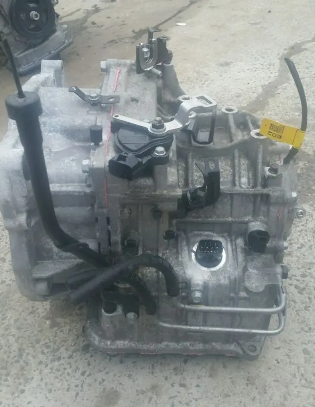 Automatic transmission case showing the control unit connector and wiring
